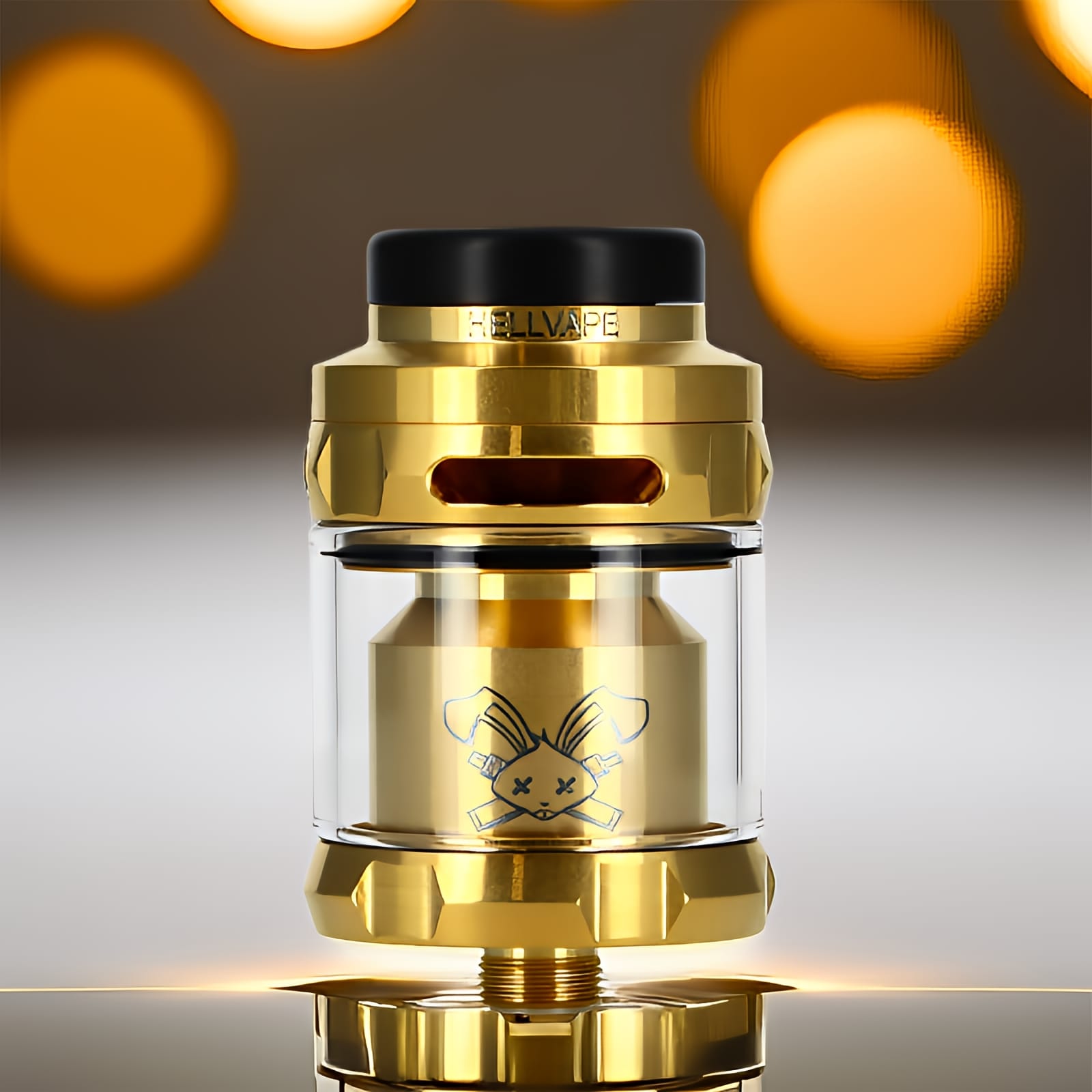 Atomiseur Dead Rabbit Solo RTA doré Hellvape avec un design anguleux et facetté